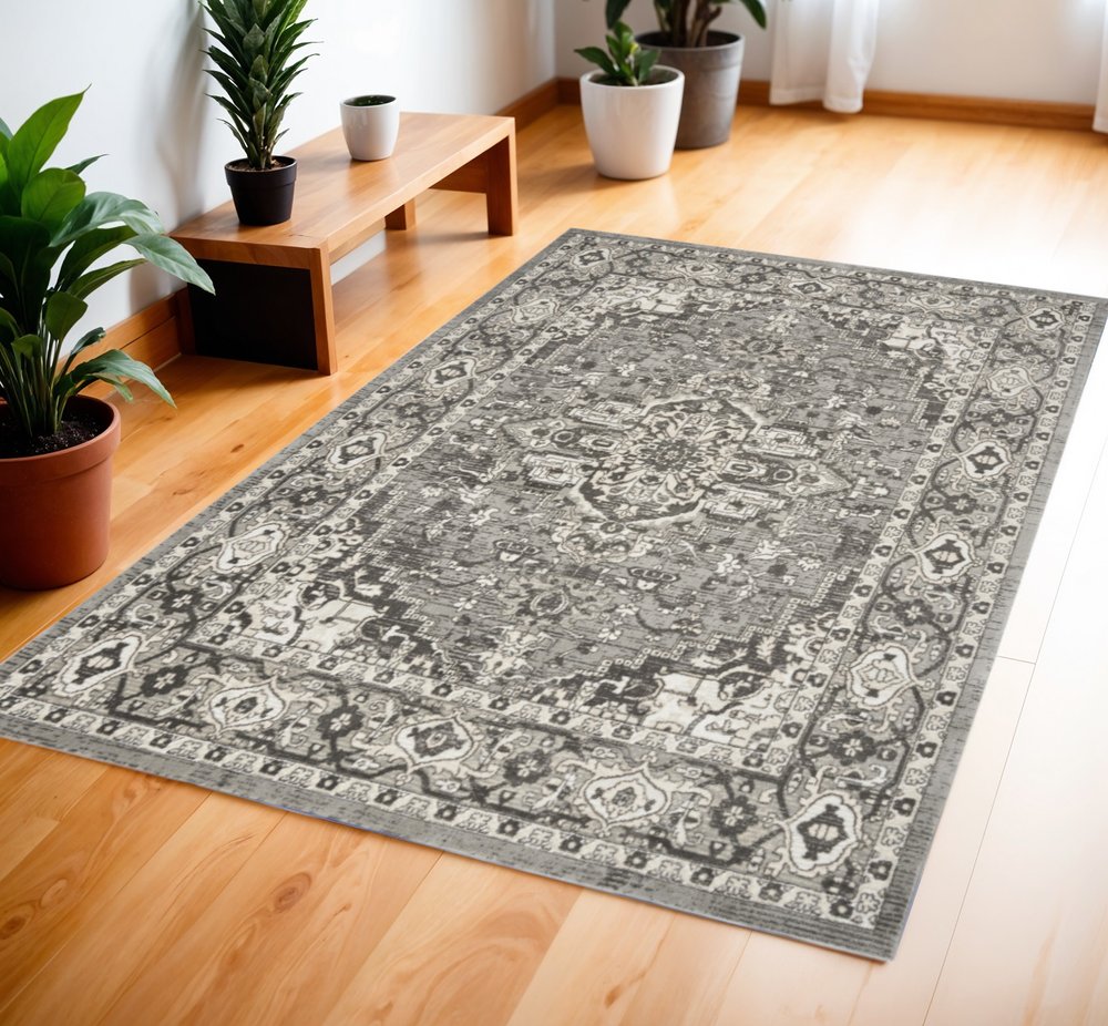 4' X 6' Gray and Ivory Medallion Power Loom Distressed Area Rug