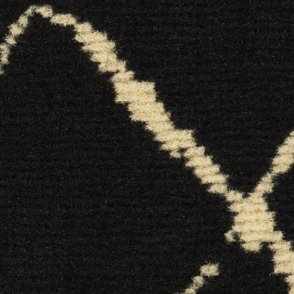 6' X 9' Black and Ivory Abstract Power Loom Distressed Area Rug