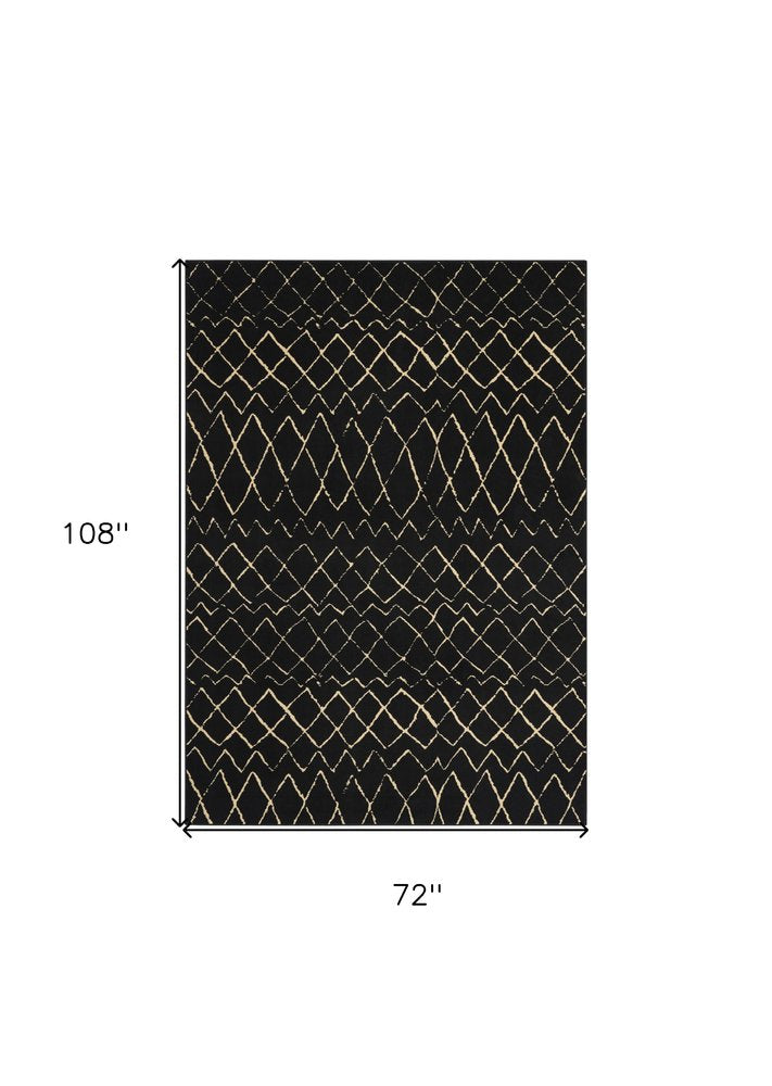 6' X 9' Black and Ivory Abstract Power Loom Distressed Area Rug