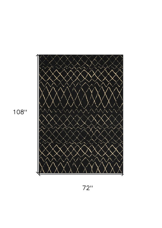 6' X 9' Black and Ivory Abstract Power Loom Distressed Area Rug