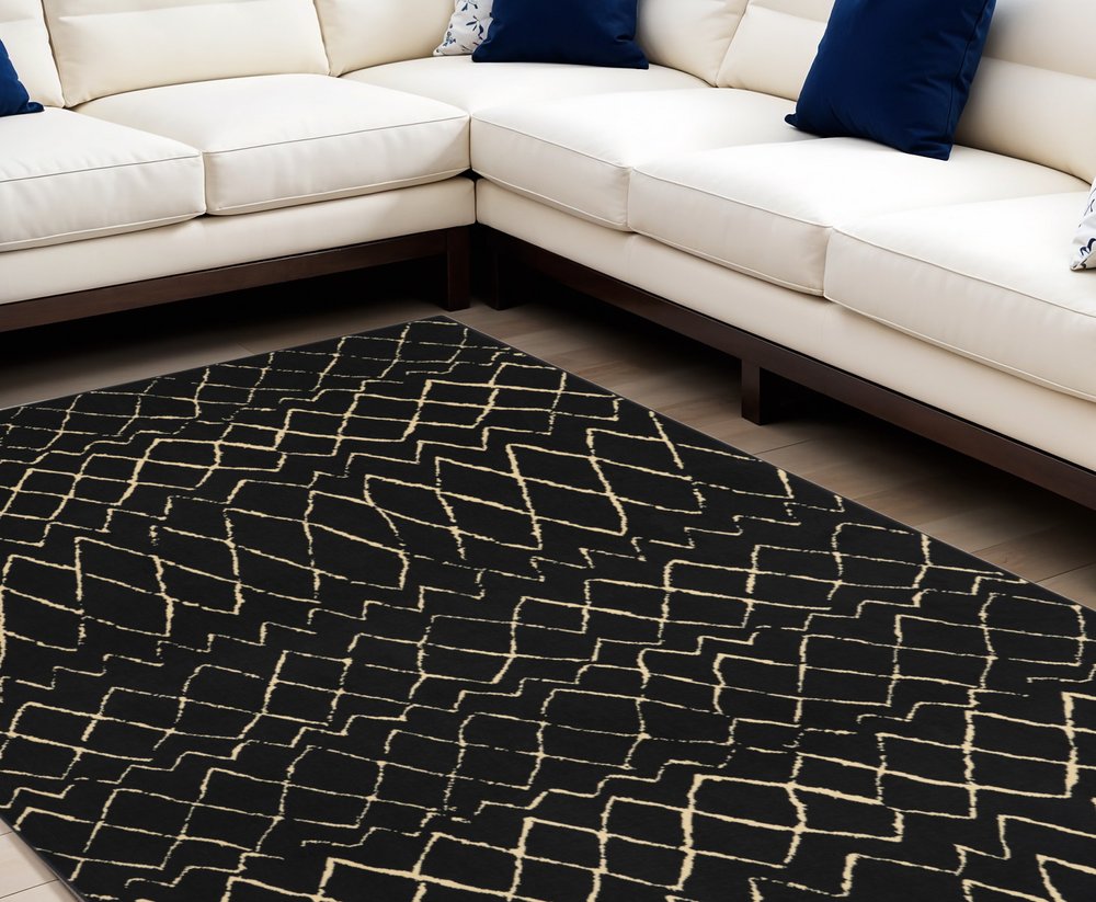 7' X 10' Black and Ivory Abstract Power Loom Distressed Area Rug