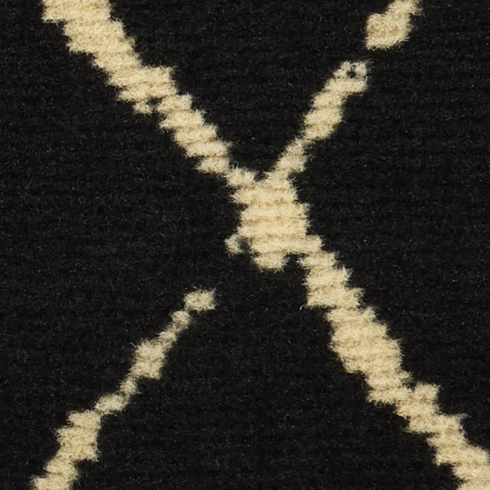 7' X 10' Black and Ivory Abstract Power Loom Distressed Area Rug