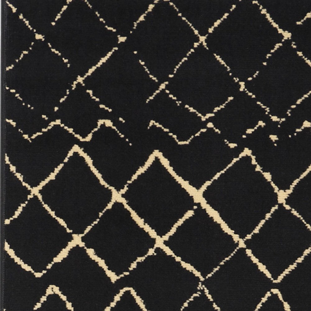 8' Black And Ivory Abstract Distressed Runner Rug