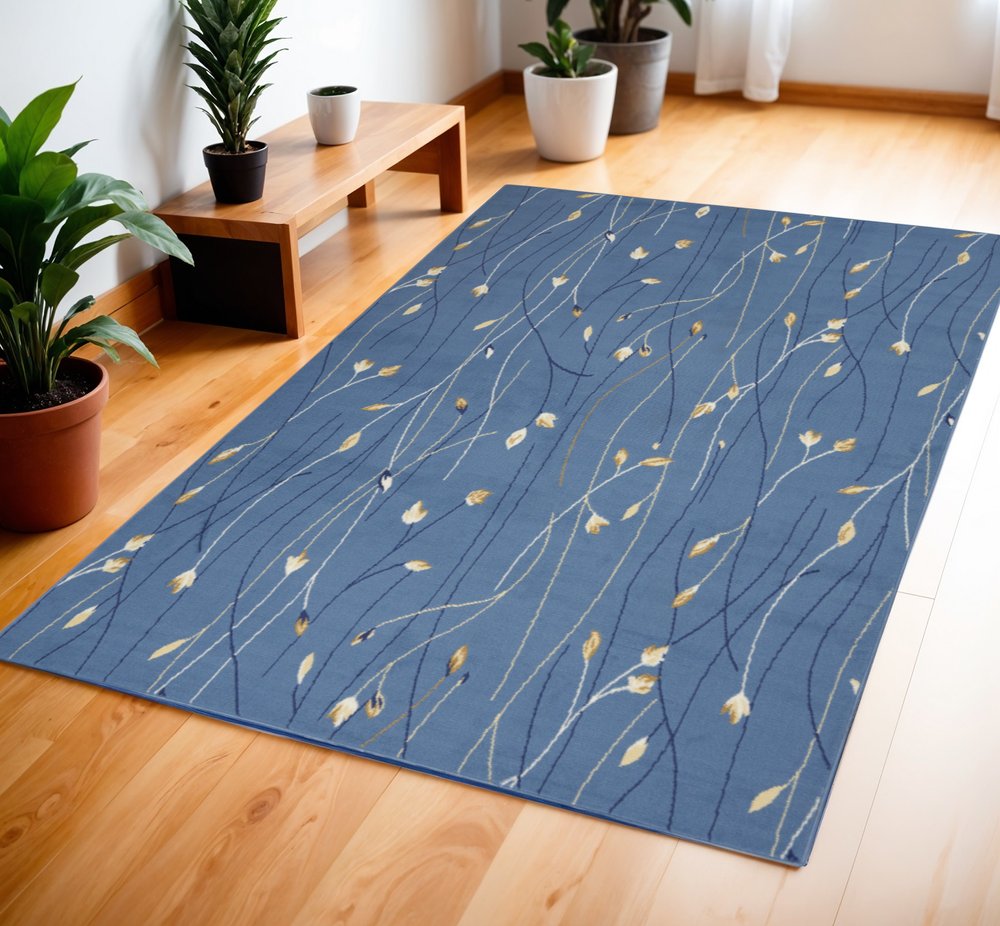 4' X 6' Blue and Beige Floral Power Loom Area Rug