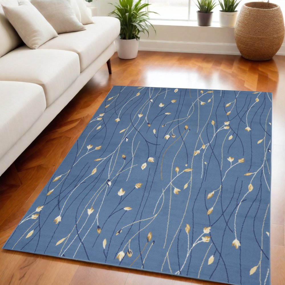5' X 7' Blue and Beige Floral Power Loom Area Rug