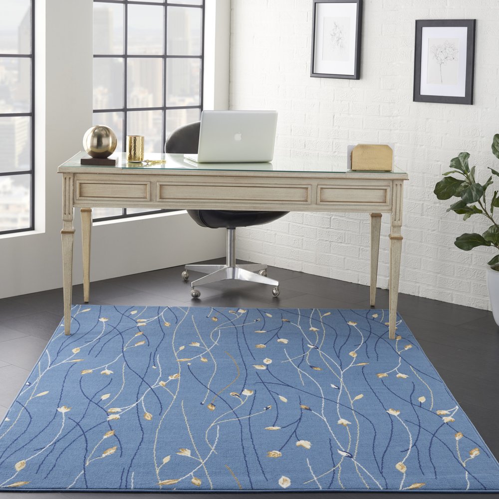 5' X 7' Blue and Beige Floral Power Loom Area Rug