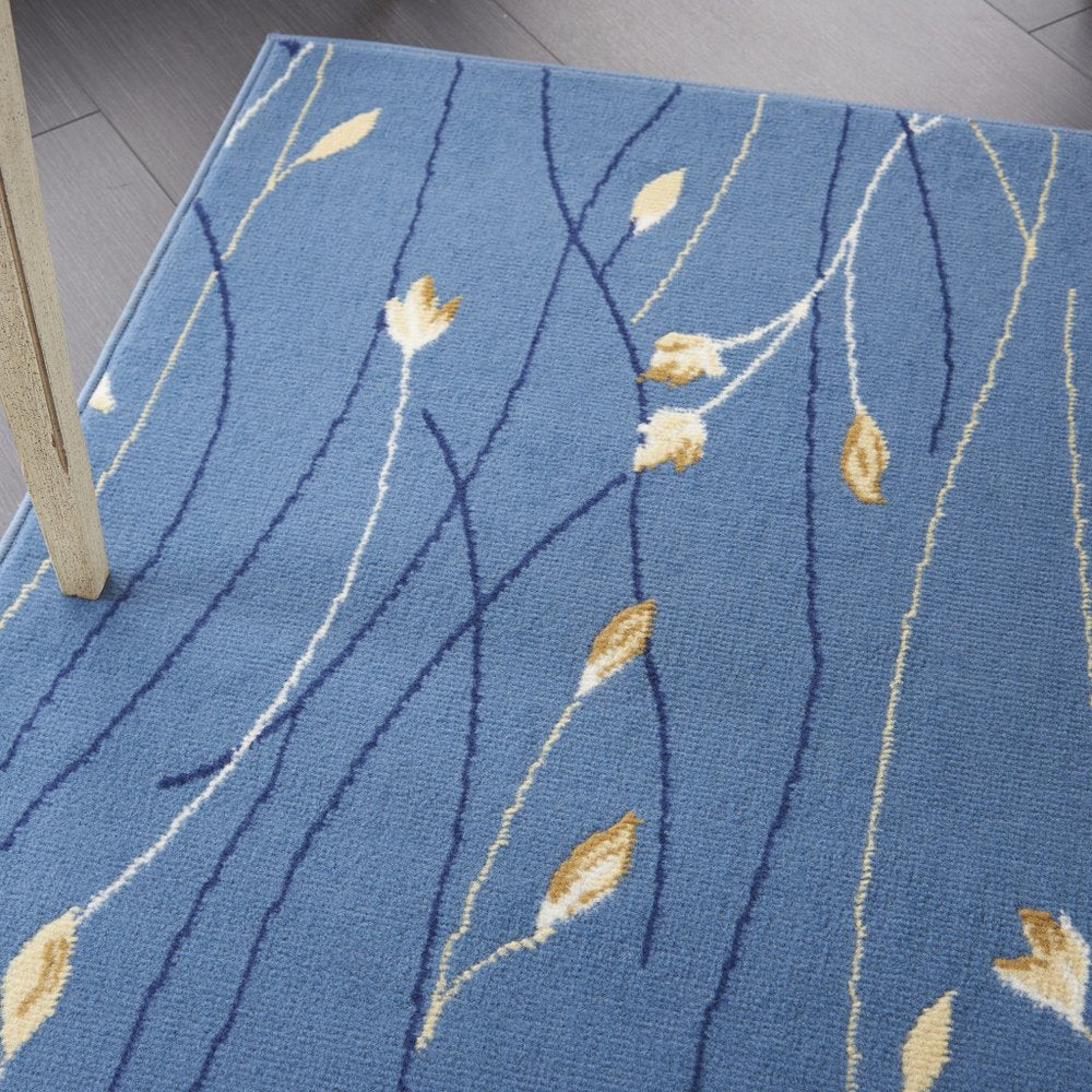 5' X 7' Blue and Beige Floral Power Loom Area Rug