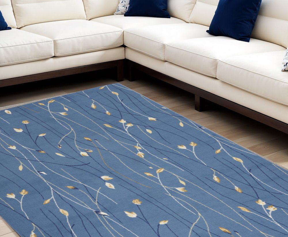 6' X 9' Blue and Beige Floral Power Loom Area Rug