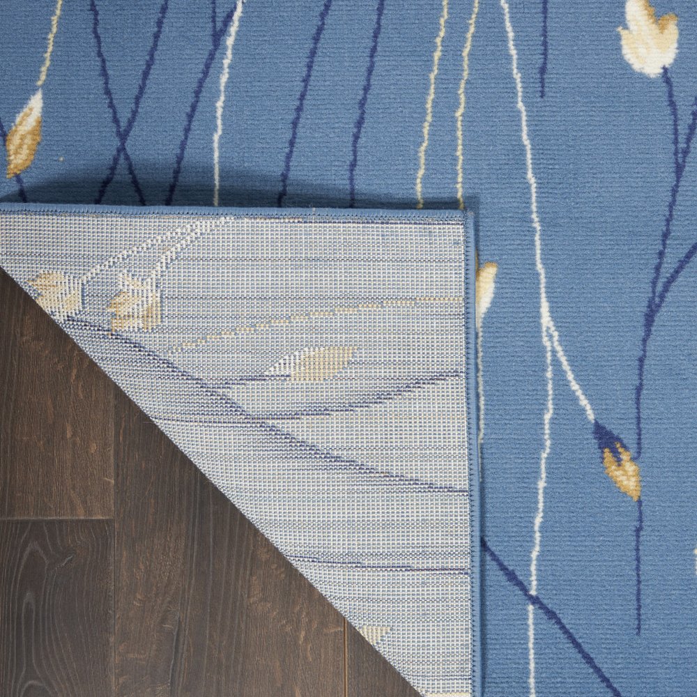 6' X 9' Blue and Beige Floral Power Loom Area Rug