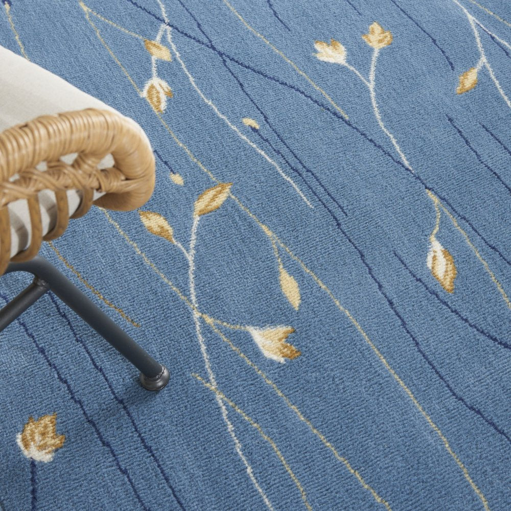 7' X 10' Blue and Beige Floral Power Loom Area Rug