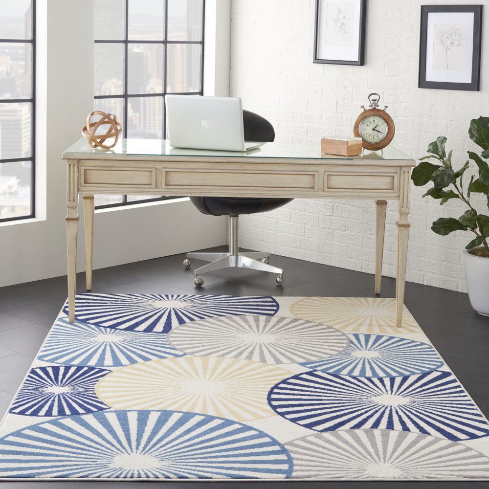 5' X 7' Blue and Ivory Geometric Power Loom Area Rug