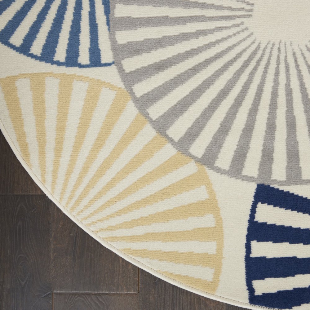 8' Blue and Ivory Round Geometric Power Loom Area Rug