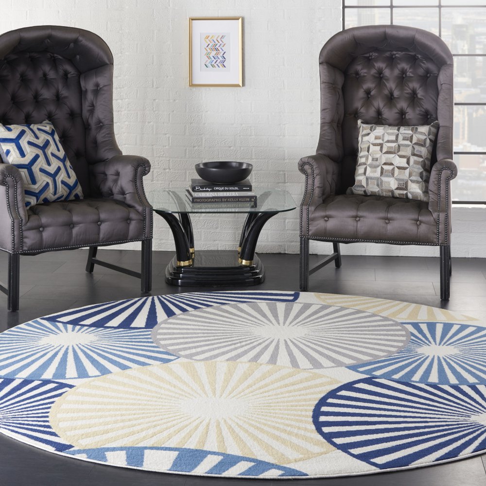 8' Blue and Ivory Round Geometric Power Loom Area Rug