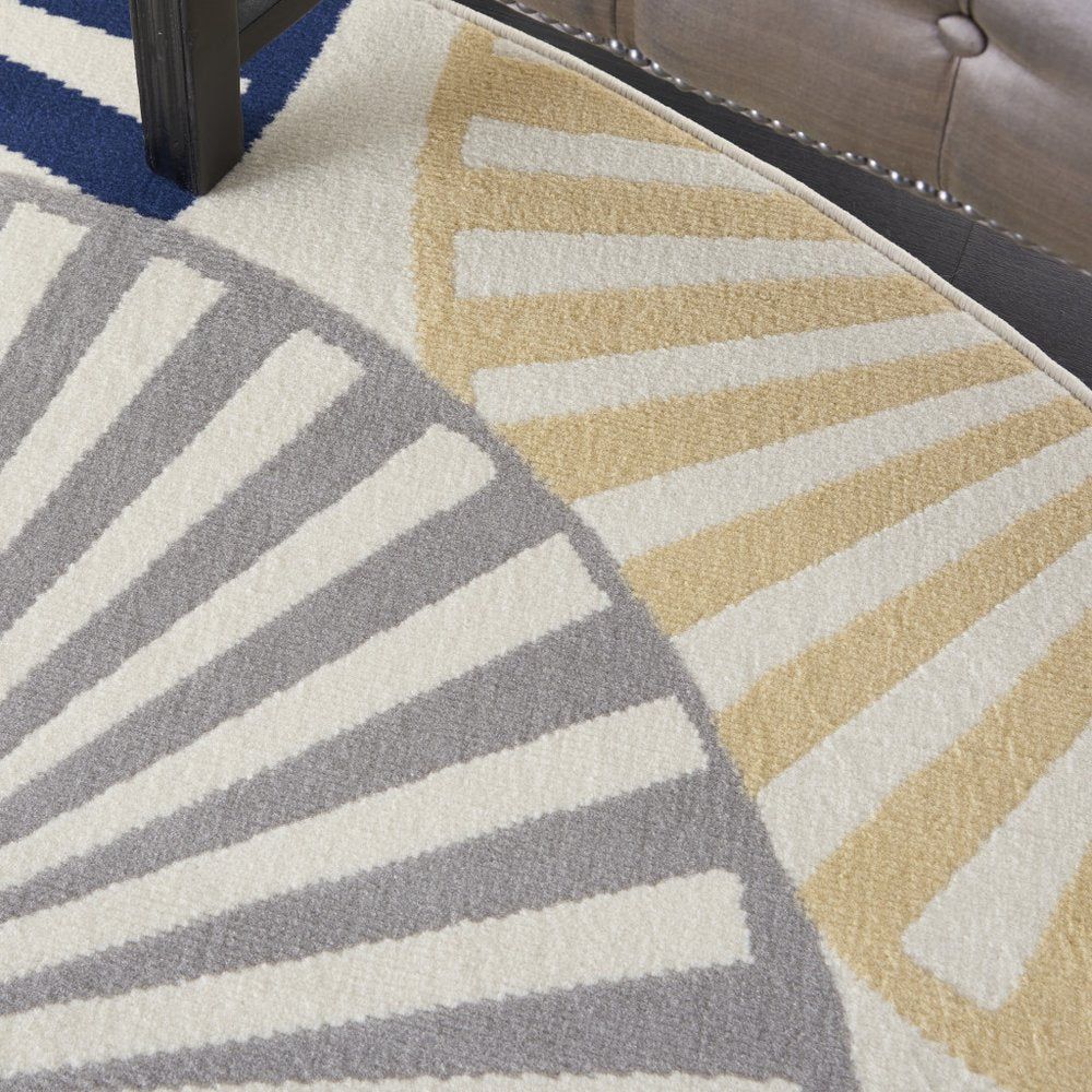 8' Blue and Ivory Round Geometric Power Loom Area Rug