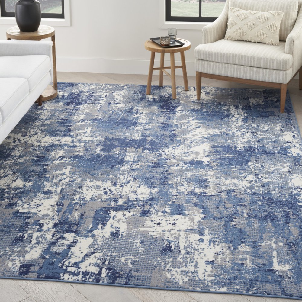 8' X 10' Blue and Ivory Abstract Power Loom Area Rug