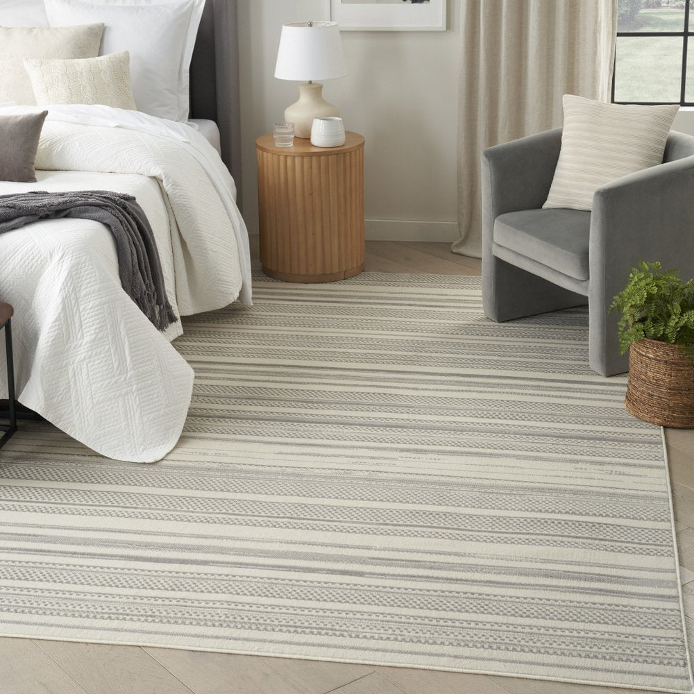 5' X 7' Gray and Ivory Striped Power Loom Distressed Area Rug