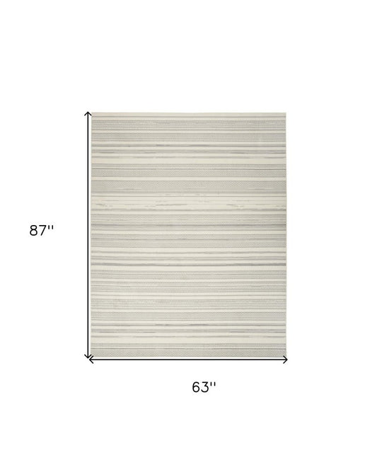 5' X 7' Gray and Ivory Striped Power Loom Distressed Area Rug