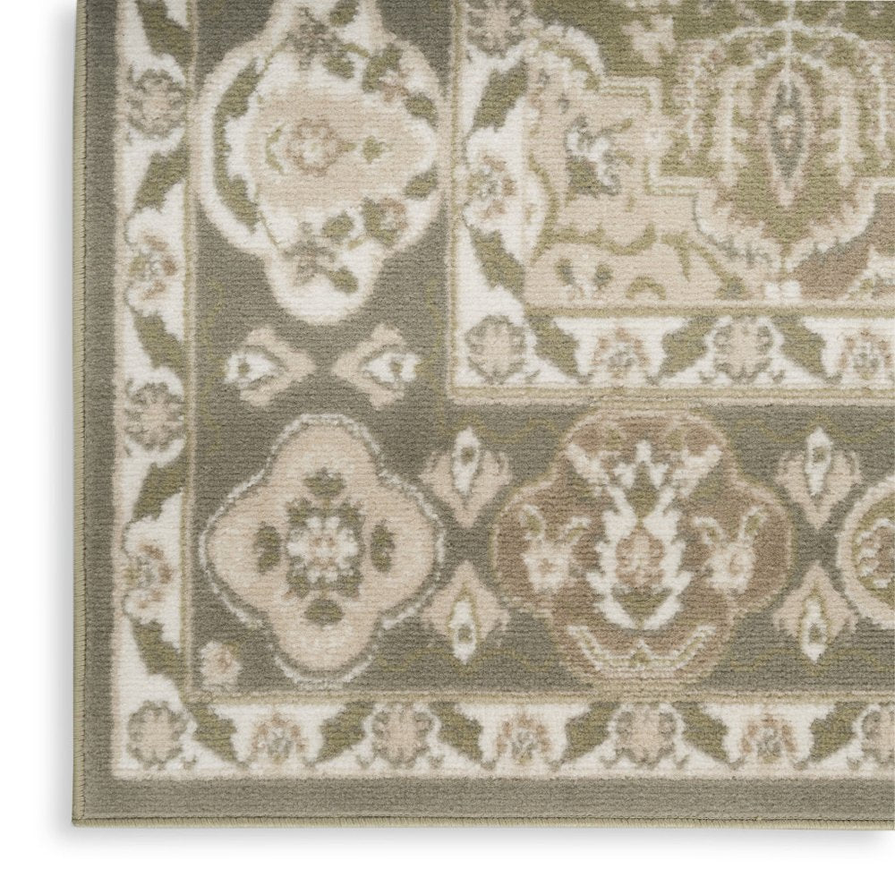 5' X 7' Green and Ivory Medallion Power Loom Distressed Area Rug