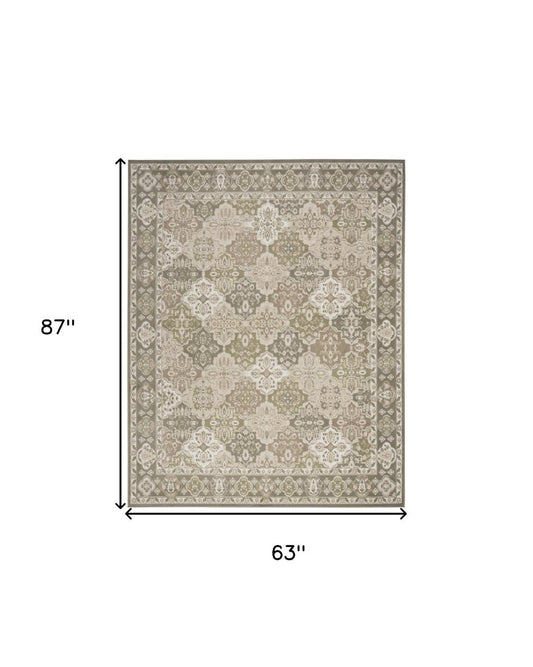 5' X 7' Green and Ivory Medallion Power Loom Distressed Area Rug