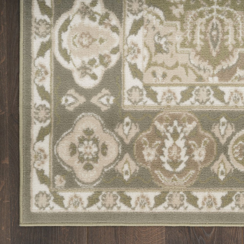 5' X 7' Green and Ivory Medallion Power Loom Distressed Area Rug