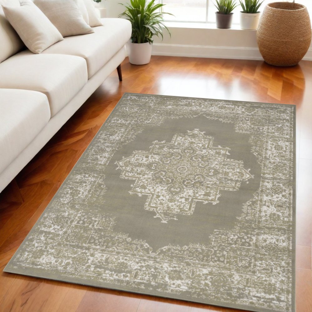 5' X 7' Green and Ivory Medallion Power Loom Distressed Area Rug