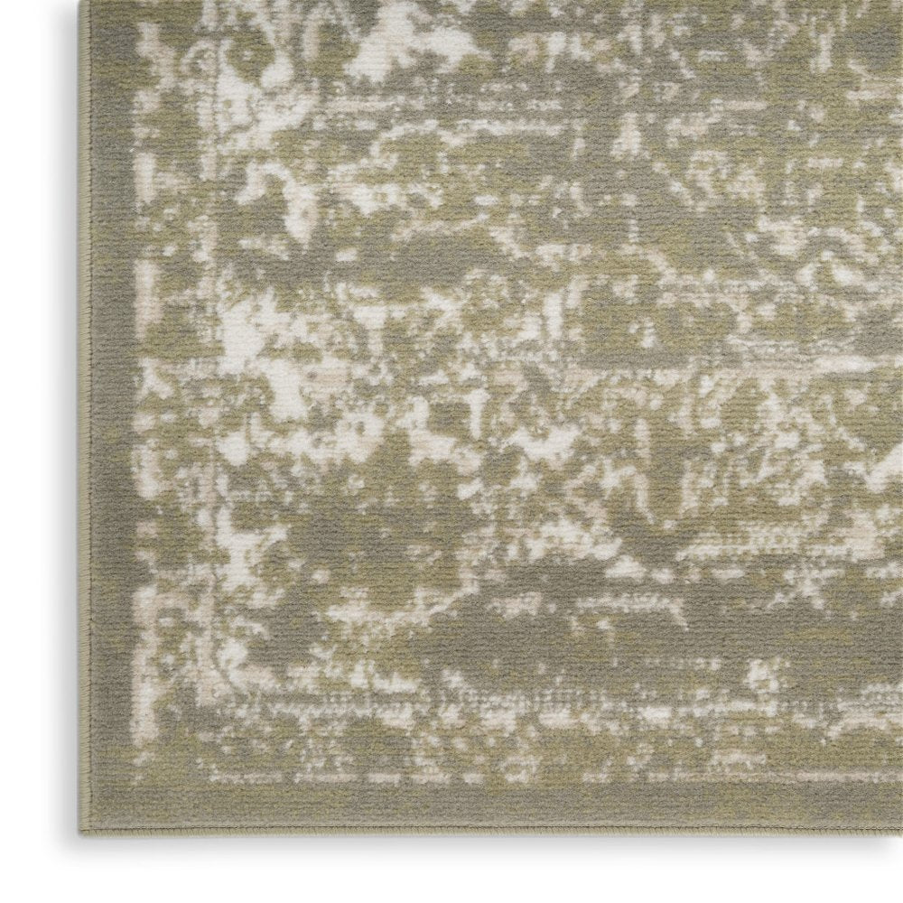 5' X 7' Green and Ivory Medallion Power Loom Distressed Area Rug