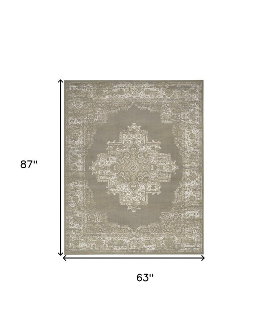 5' X 7' Green and Ivory Medallion Power Loom Distressed Area Rug