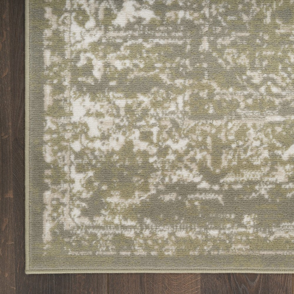 5' X 7' Green and Ivory Medallion Power Loom Distressed Area Rug
