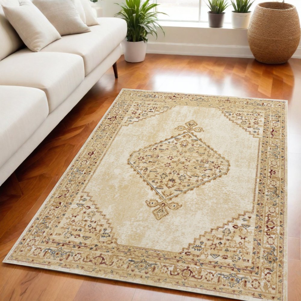 5' X 7' Beige and Ivory Medallion Power Loom Distressed Area Rug