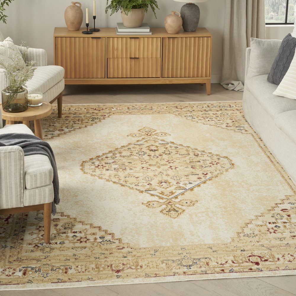 5' X 7' Beige and Ivory Medallion Power Loom Distressed Area Rug