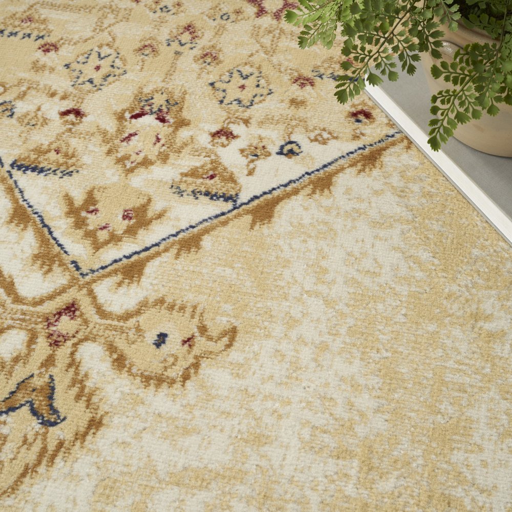 5' X 7' Beige and Ivory Medallion Power Loom Distressed Area Rug