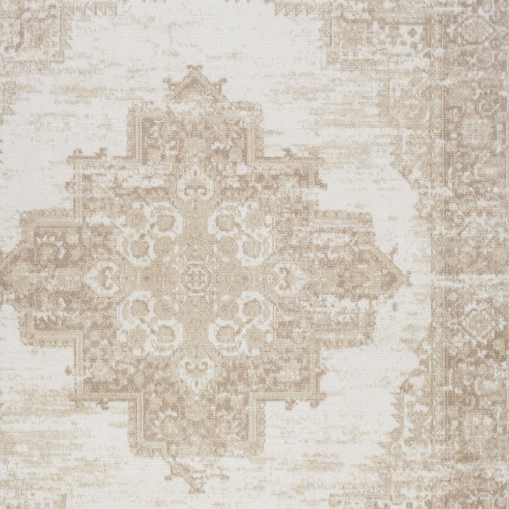 5' X 7' Beige and Ivory Medallion Power Loom Distressed Area Rug