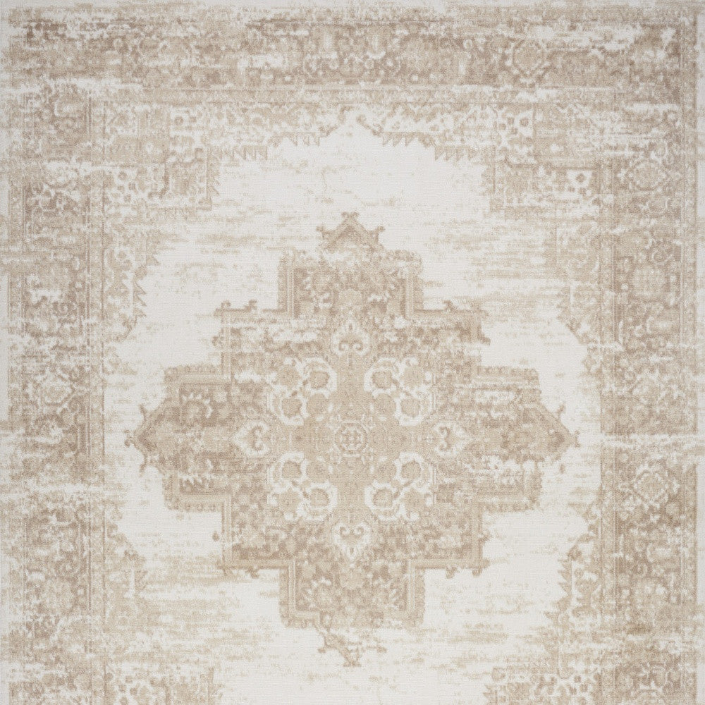 5' X 7' Beige and Ivory Medallion Power Loom Distressed Area Rug
