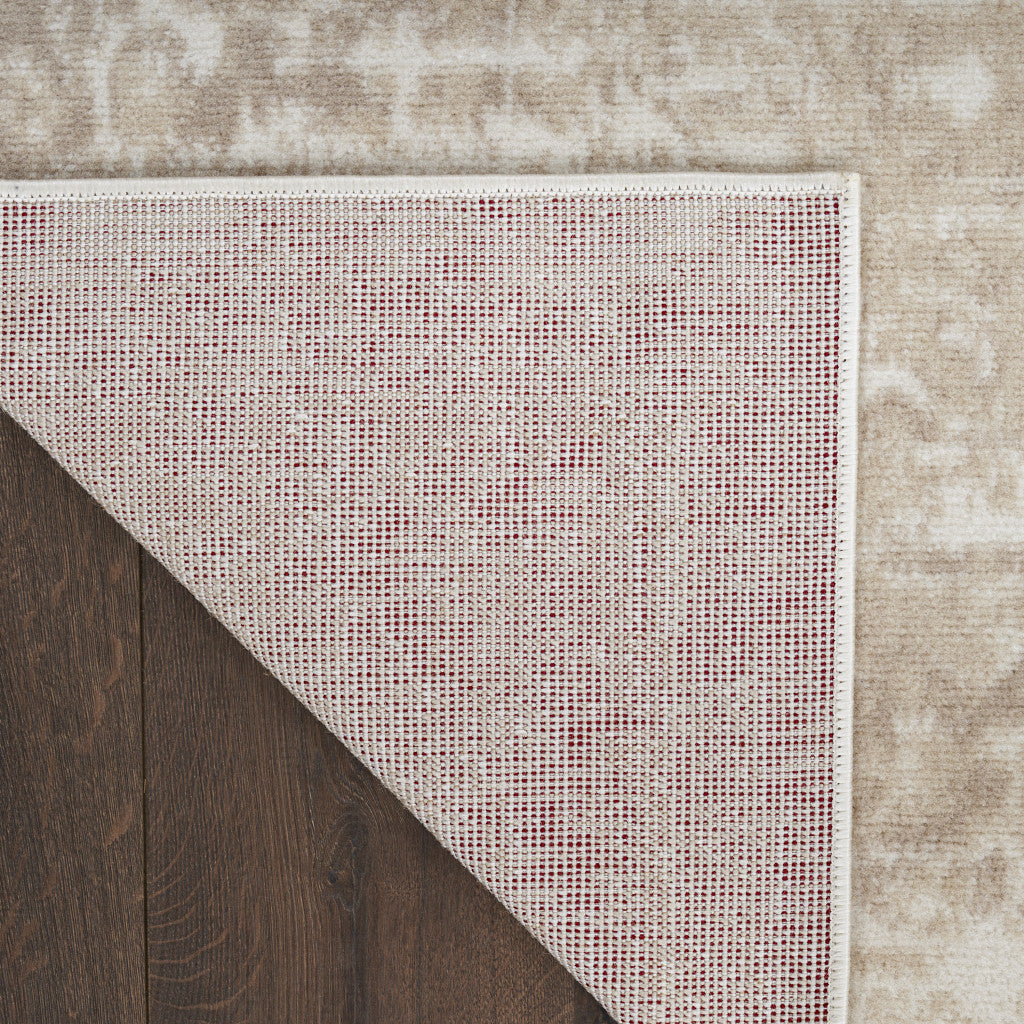 5' X 7' Beige and Ivory Medallion Power Loom Distressed Area Rug