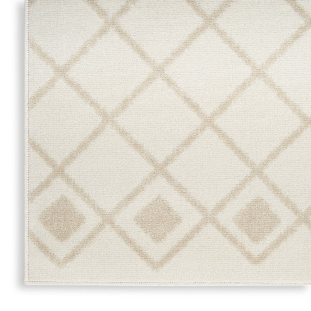 5' X 7' Beige and Ivory Moroccan Power Loom Area Rug