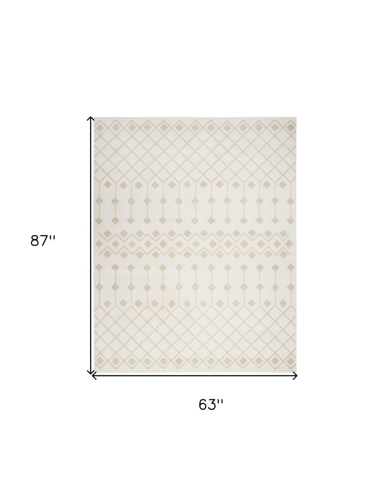 5' X 7' Beige and Ivory Moroccan Power Loom Area Rug