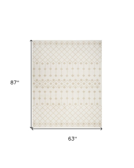 5' X 7' Beige and Ivory Moroccan Power Loom Area Rug