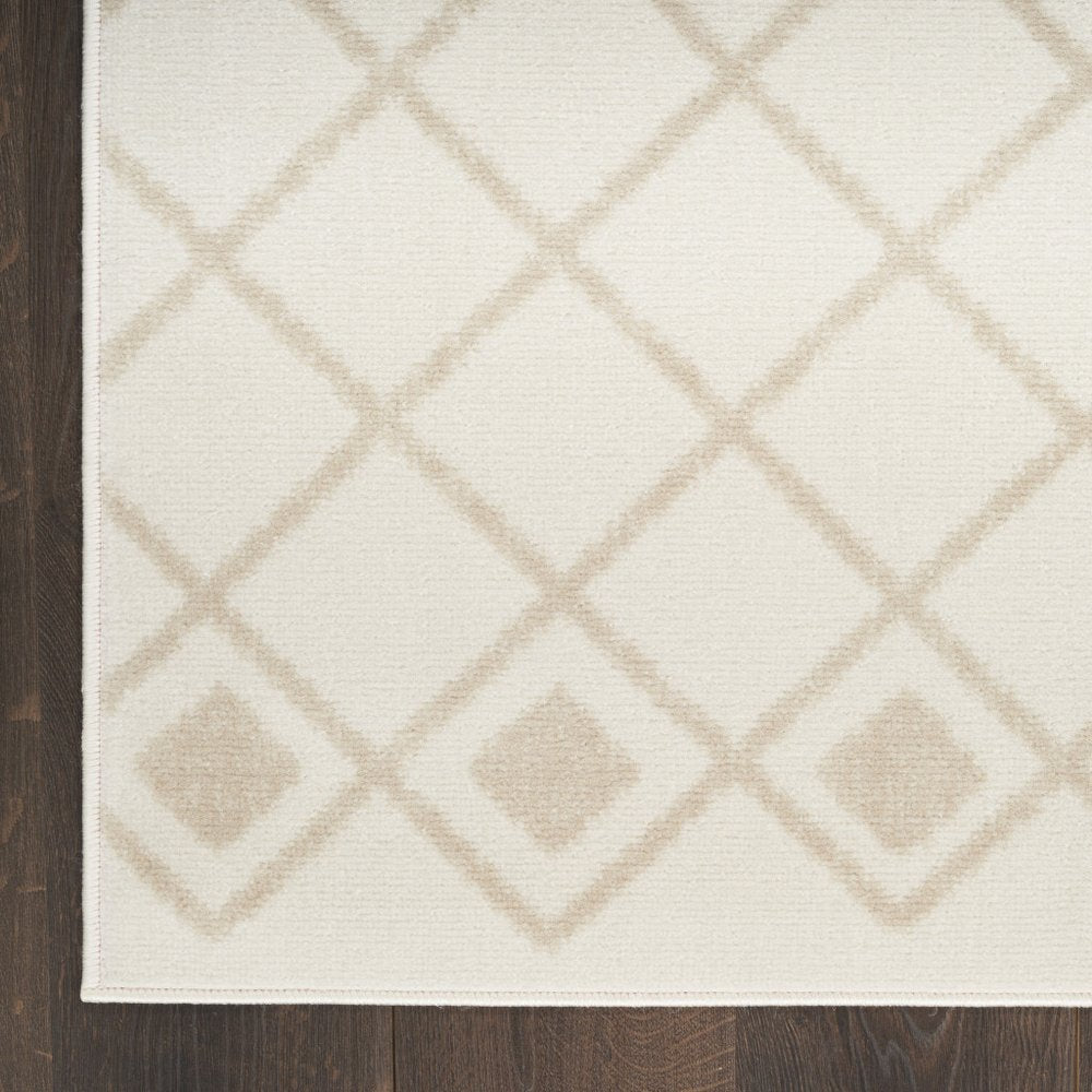 5' X 7' Beige and Ivory Moroccan Power Loom Area Rug