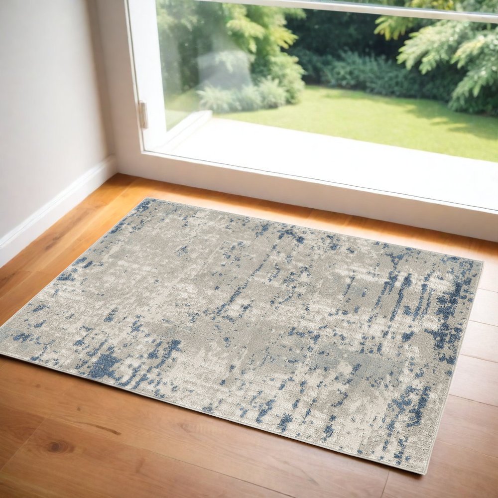 2' X 4' Gray and Ivory Abstract Power Loom Area Rug