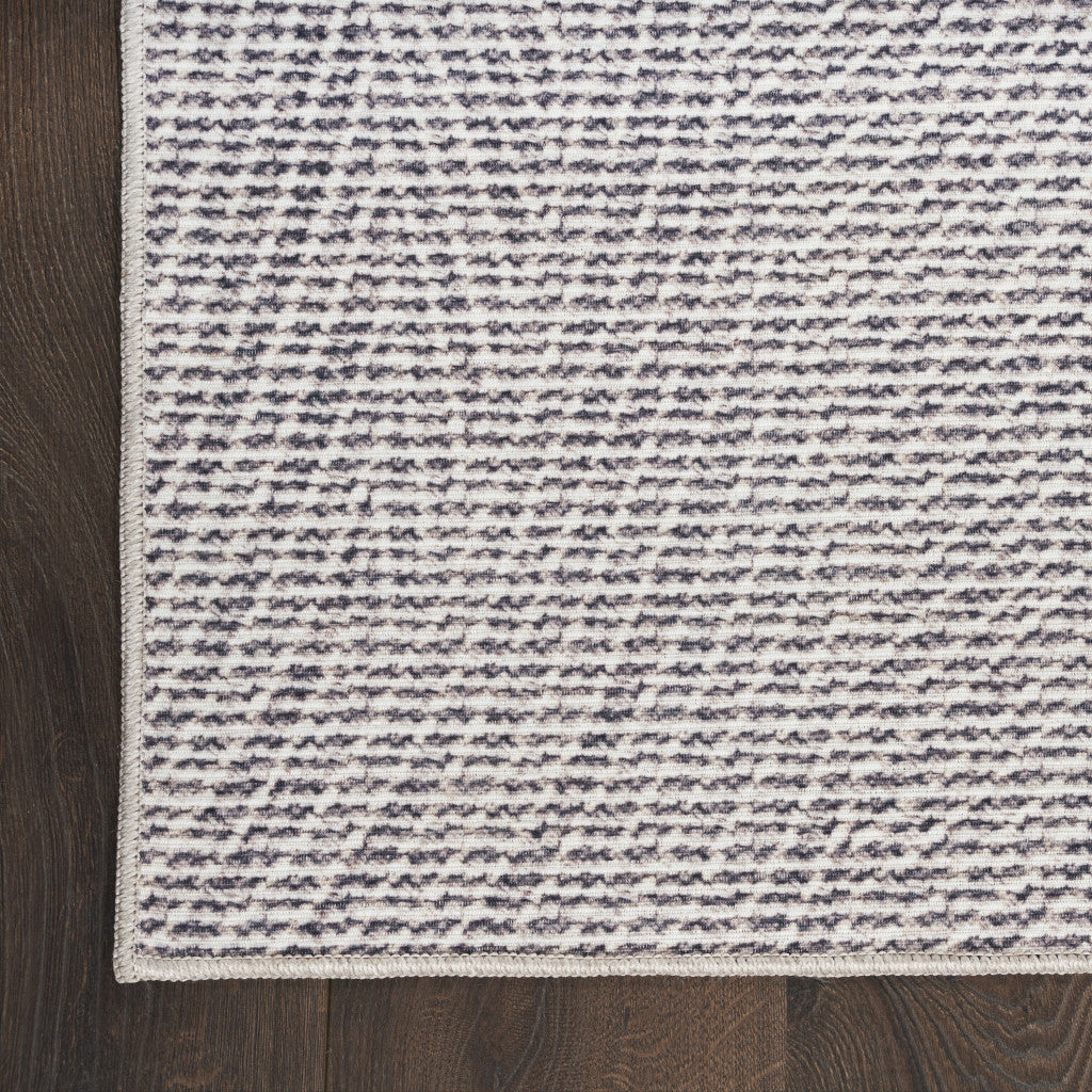 3' X 5' Gray and Ivory Abstract Power Loom Washable Non Skid Area Rug