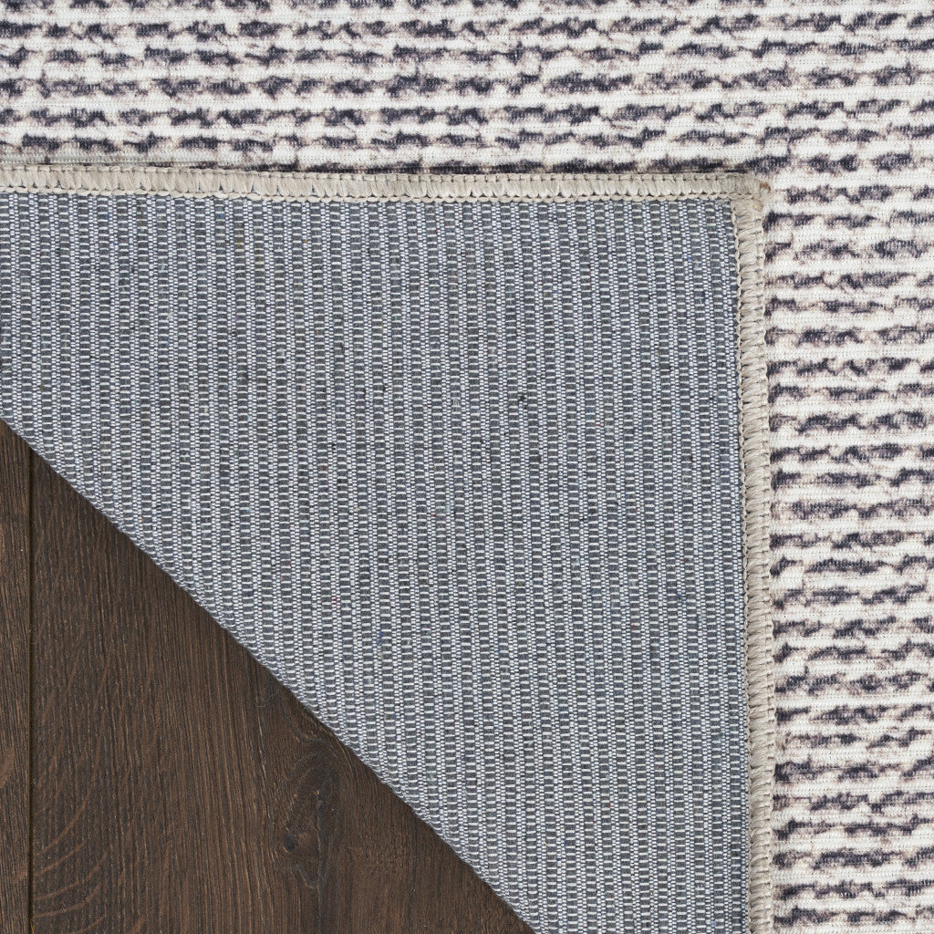 3' X 5' Gray and Ivory Abstract Power Loom Washable Non Skid Area Rug