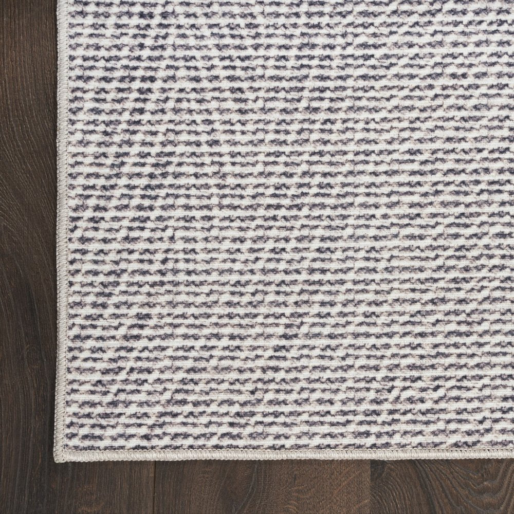 4' X 6' Gray and Ivory Abstract Power Loom Washable Non Skid Area Rug