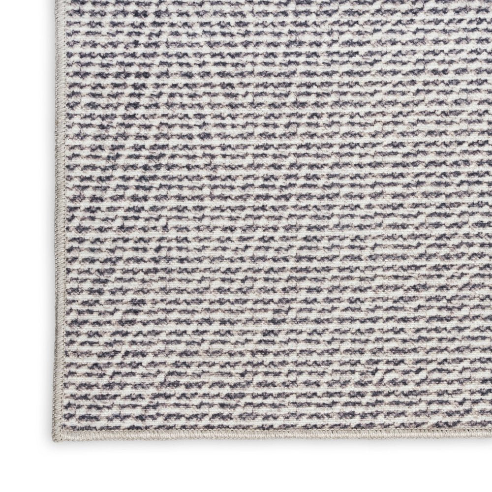 4' X 6' Gray and Ivory Abstract Power Loom Washable Non Skid Area Rug