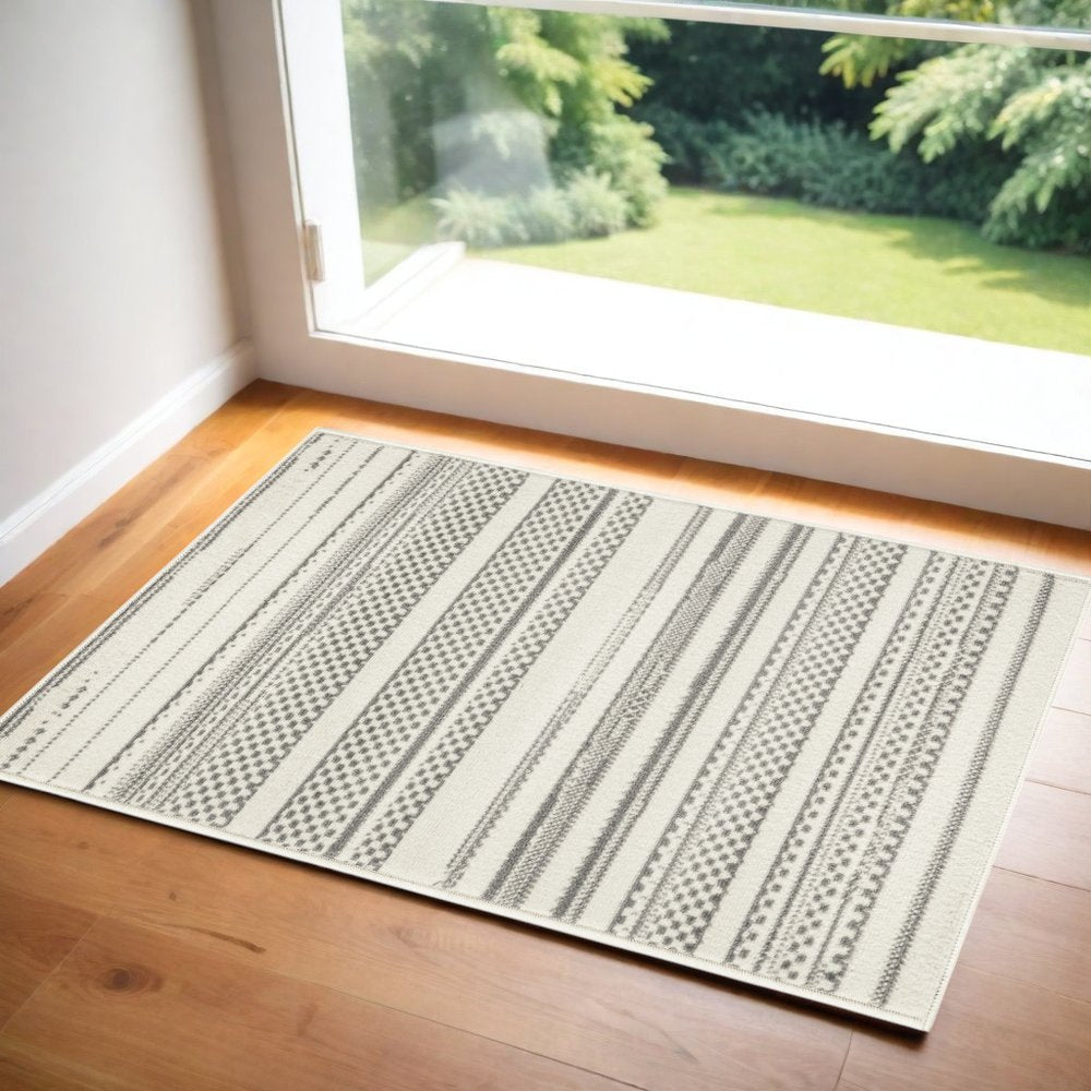 2' X 4' Gray and Ivory Striped Power Loom Distressed Area Rug