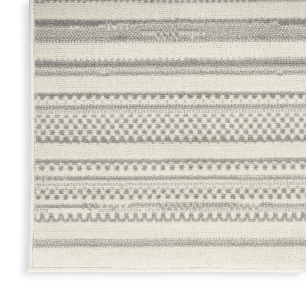2' X 4' Gray and Ivory Striped Power Loom Distressed Area Rug