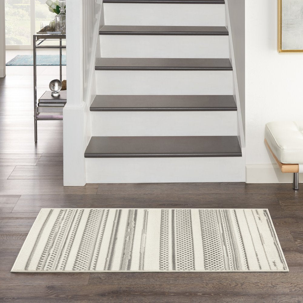 2' X 4' Gray and Ivory Striped Power Loom Distressed Area Rug