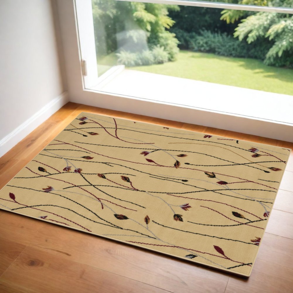 3' X 5' Ivory and Black Floral Power Loom Area Rug