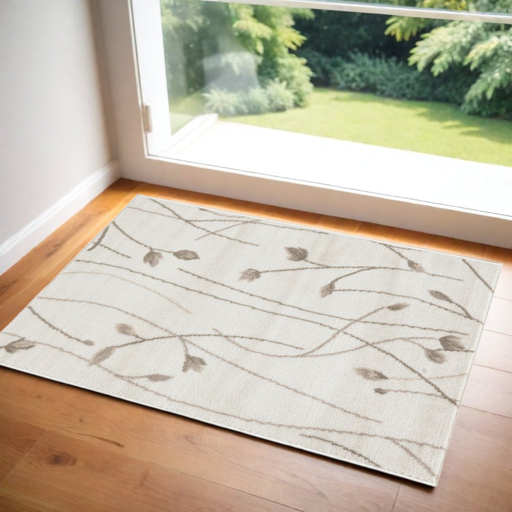 2' X 4' Beige And Ivory Floral Area Rug