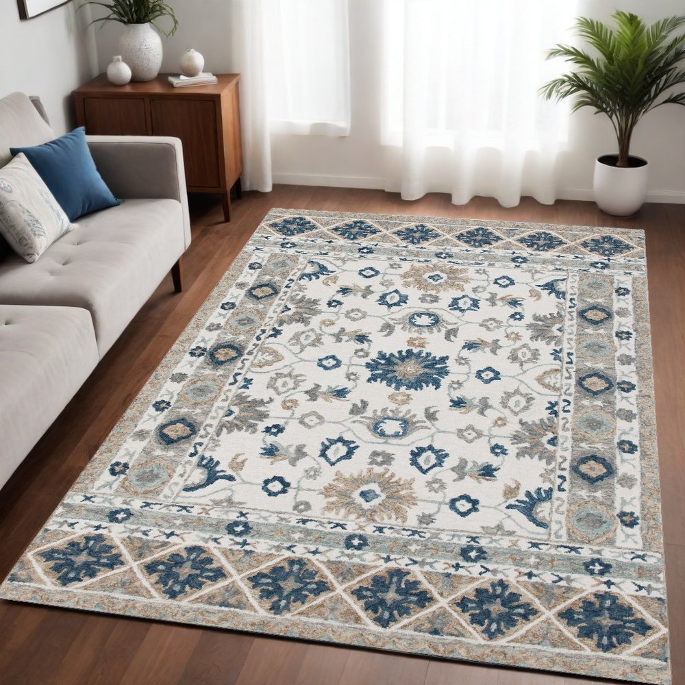 9' X 12' Blue and Ivory Wool Floral Hand Tufted Area Rug
