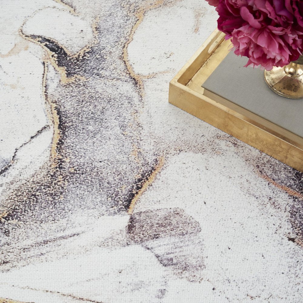 5' X 7' Black and Gold Abstract Power Loom Area Rug